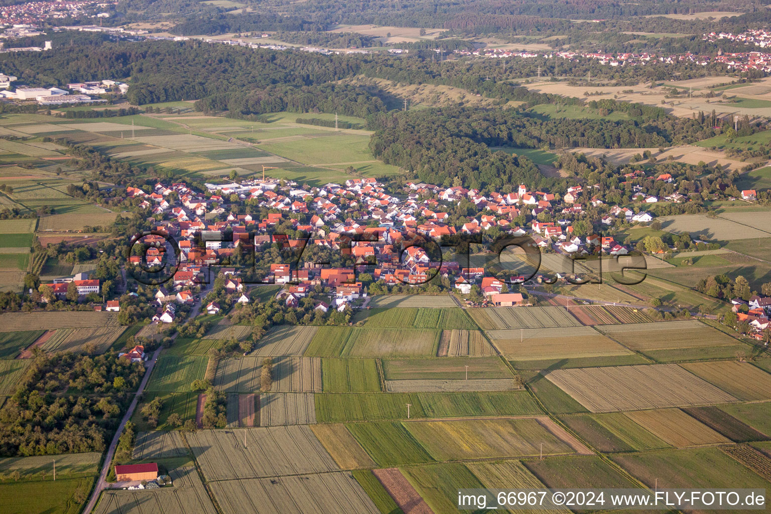 Village - view on the edge of agricultural fields and farmland in Maehringen in the state Baden-Wurttemberg, Germany