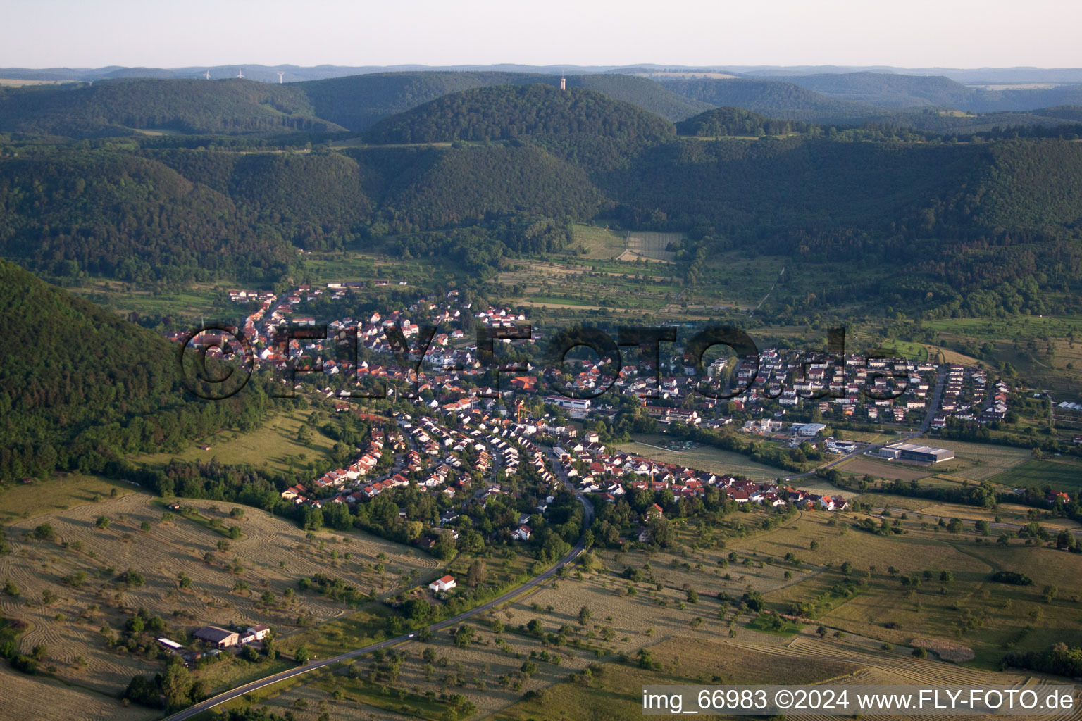 Aerial view of Village - view on the edge of agricultural fields and farmland in Reutlingen in the state Baden-Wurttemberg, Germany