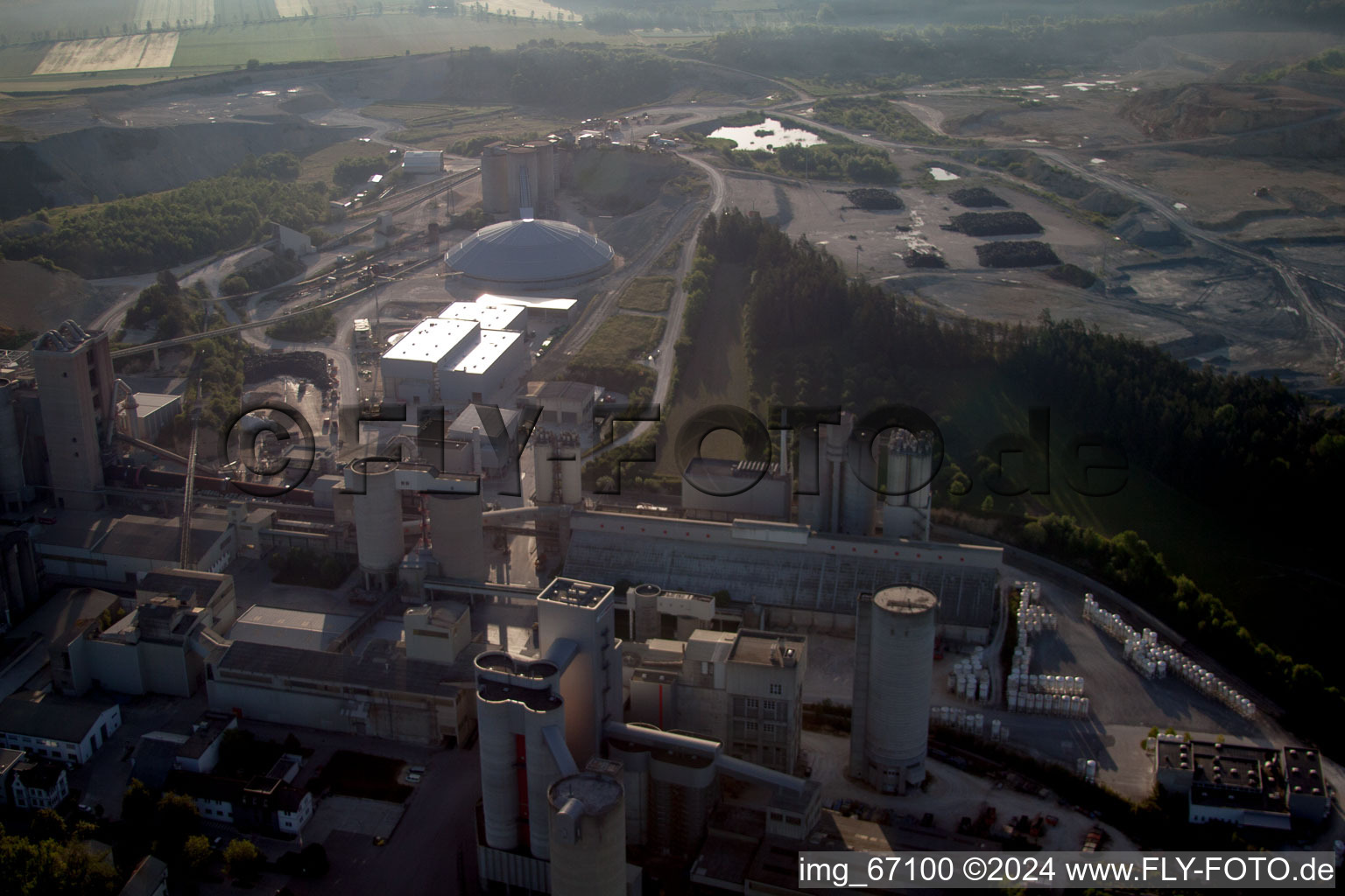 Aerial view of Mixed concrete and building materials factory of Schwenk Zement KG Fabrikstrasse in the district Pfraunstetten in Allmendingen in the state Baden-Wurttemberg