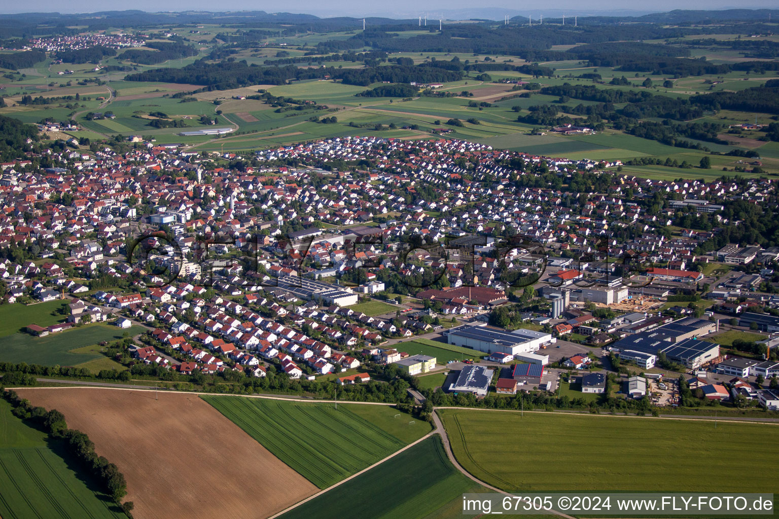 Aerial view of Village - view on the edge of agricultural fields and farmland in Laichingen in the state Baden-Wurttemberg, Germany