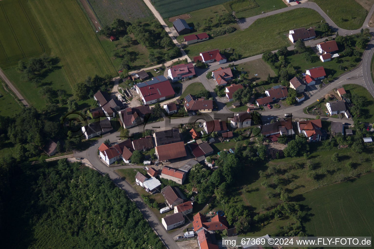 Aerial view of Village - view on the edge of agricultural fields and farmland in Briel in the state Baden-Wurttemberg