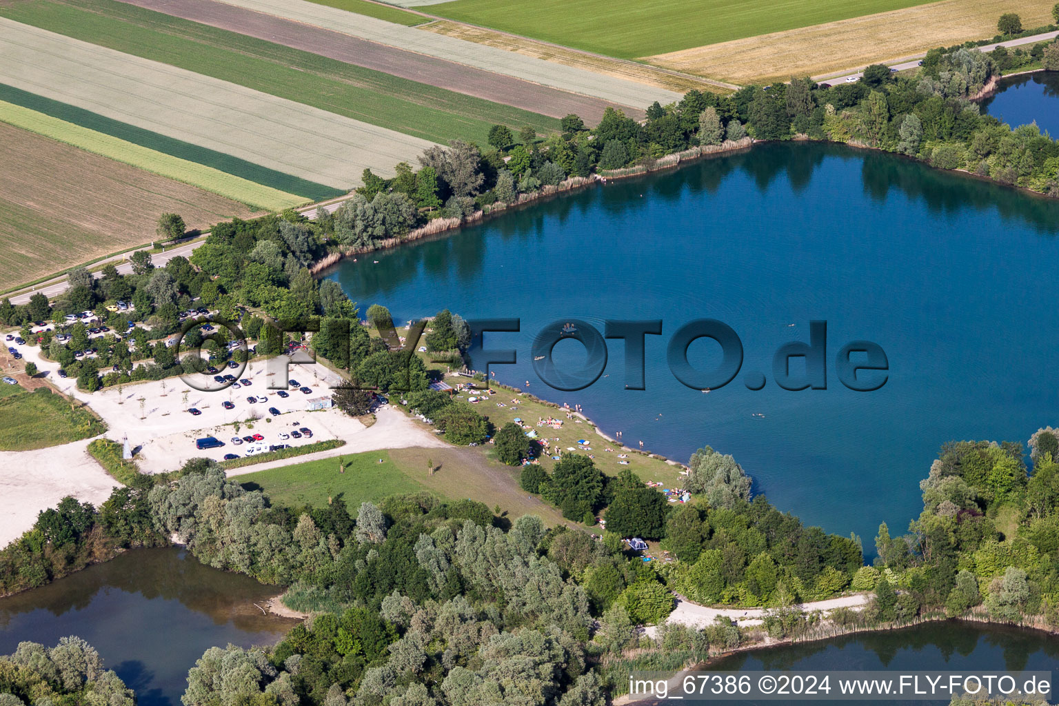 Mass influx of bathers on the beach and the shore areas of the lake Heppenaecker in Rottenacker in the state Baden-Wurttemberg, Germany