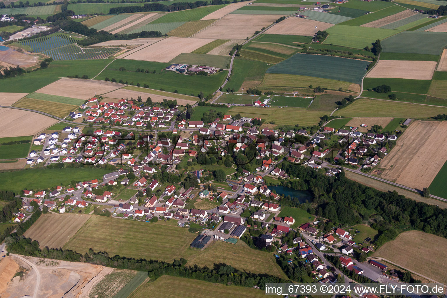 Village - view on the edge of agricultural fields and farmland in Alberweiler in the state Baden-Wurttemberg, Germany