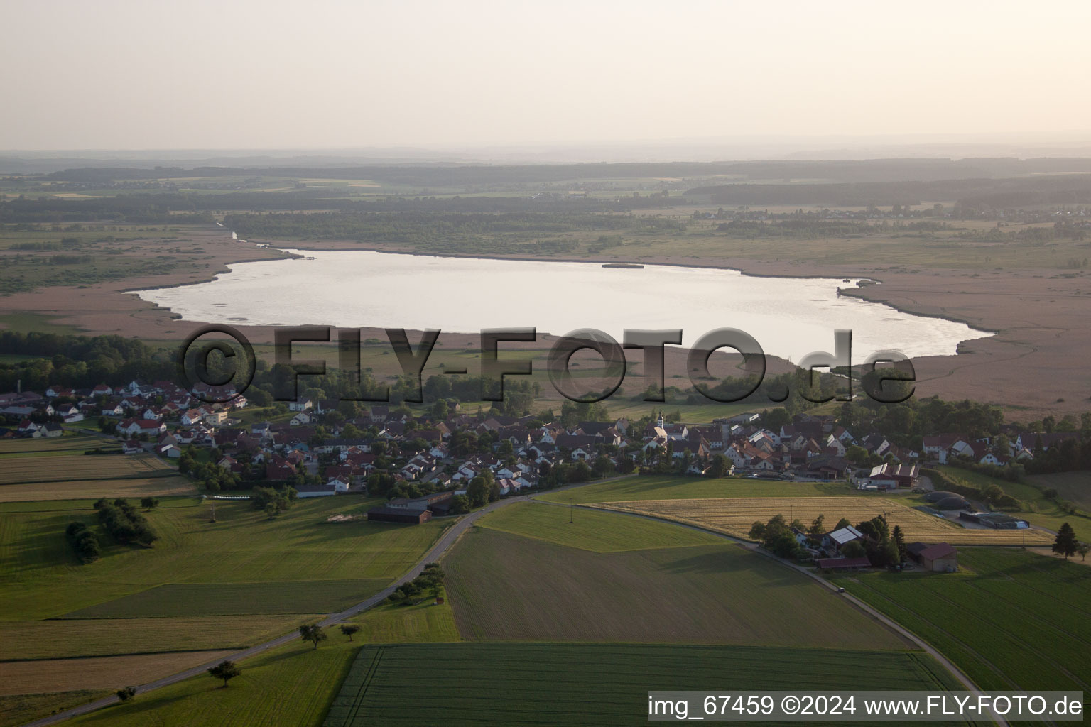 Village in front of the Federsee with stilt houses in Tiefenbach in the state Baden-Wuerttemberg, Germany