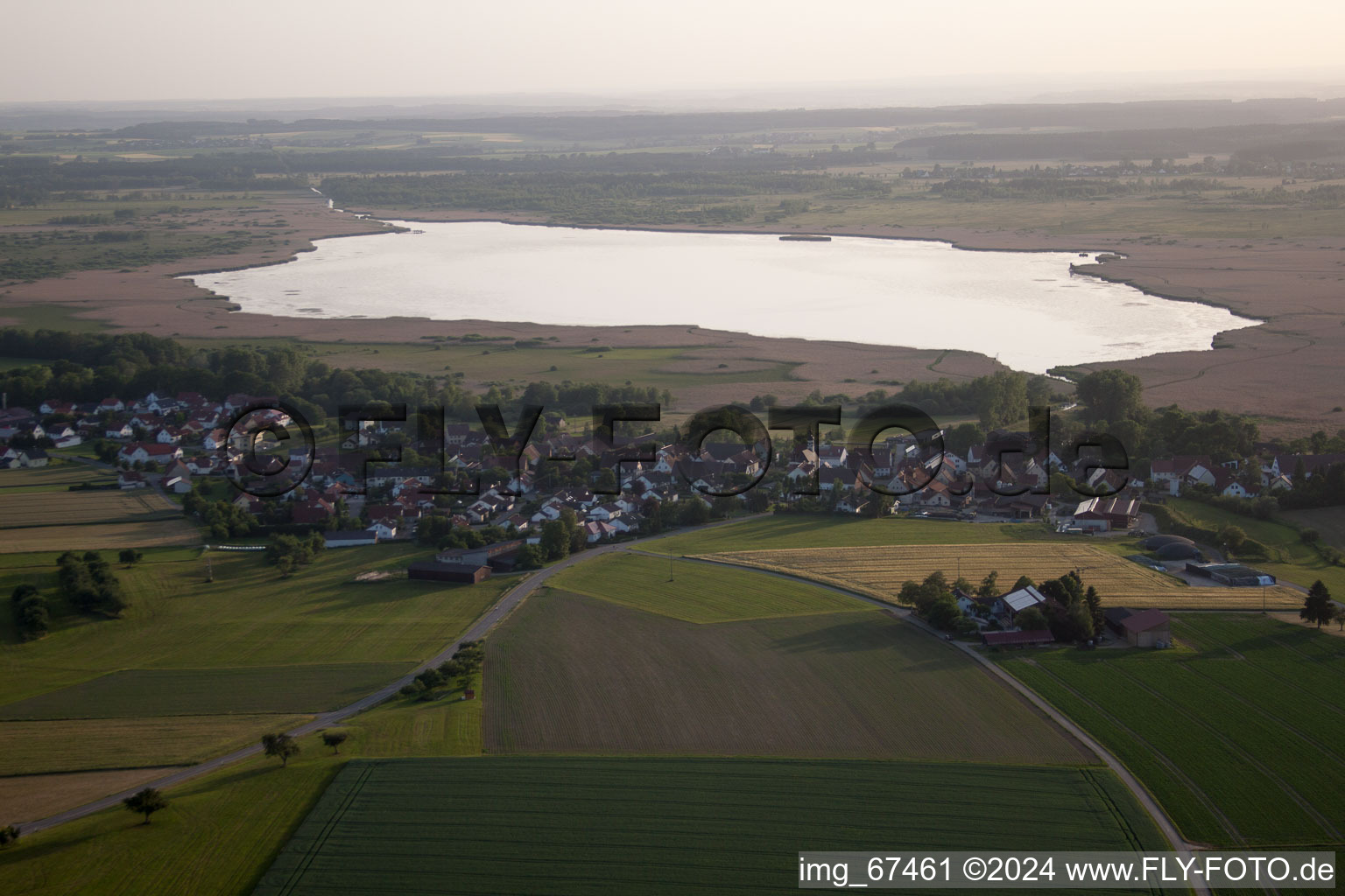 Aerial view of Village in front of the Federsee with stilt houses in Tiefenbach in the state Baden-Wuerttemberg, Germany