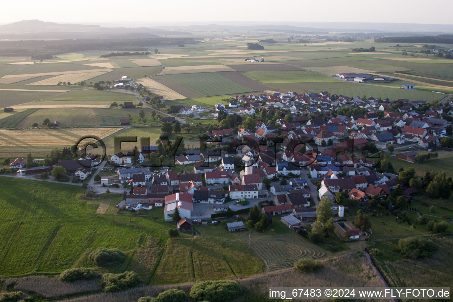 View of the streets and houses of the residential areas in Alleshausen in the state Baden-Wuerttemberg, Germany