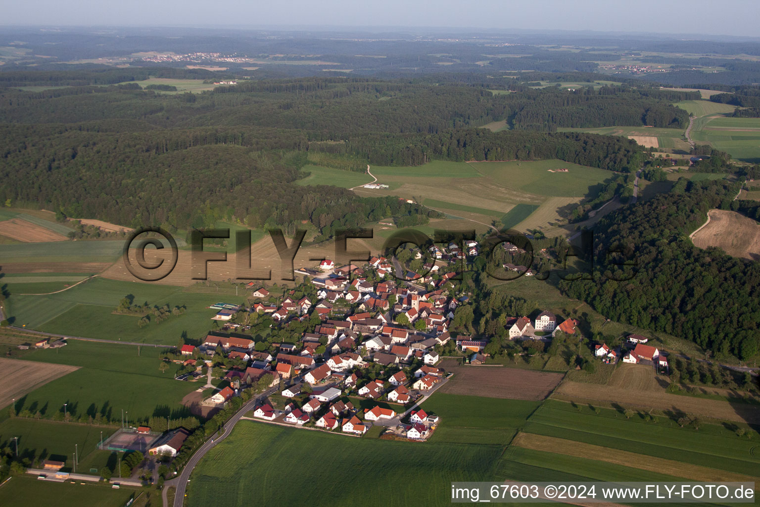 Aerial view of Village - view on the edge of agricultural fields and farmland in Ehingen (Donau) in the state Baden-Wurttemberg, Germany