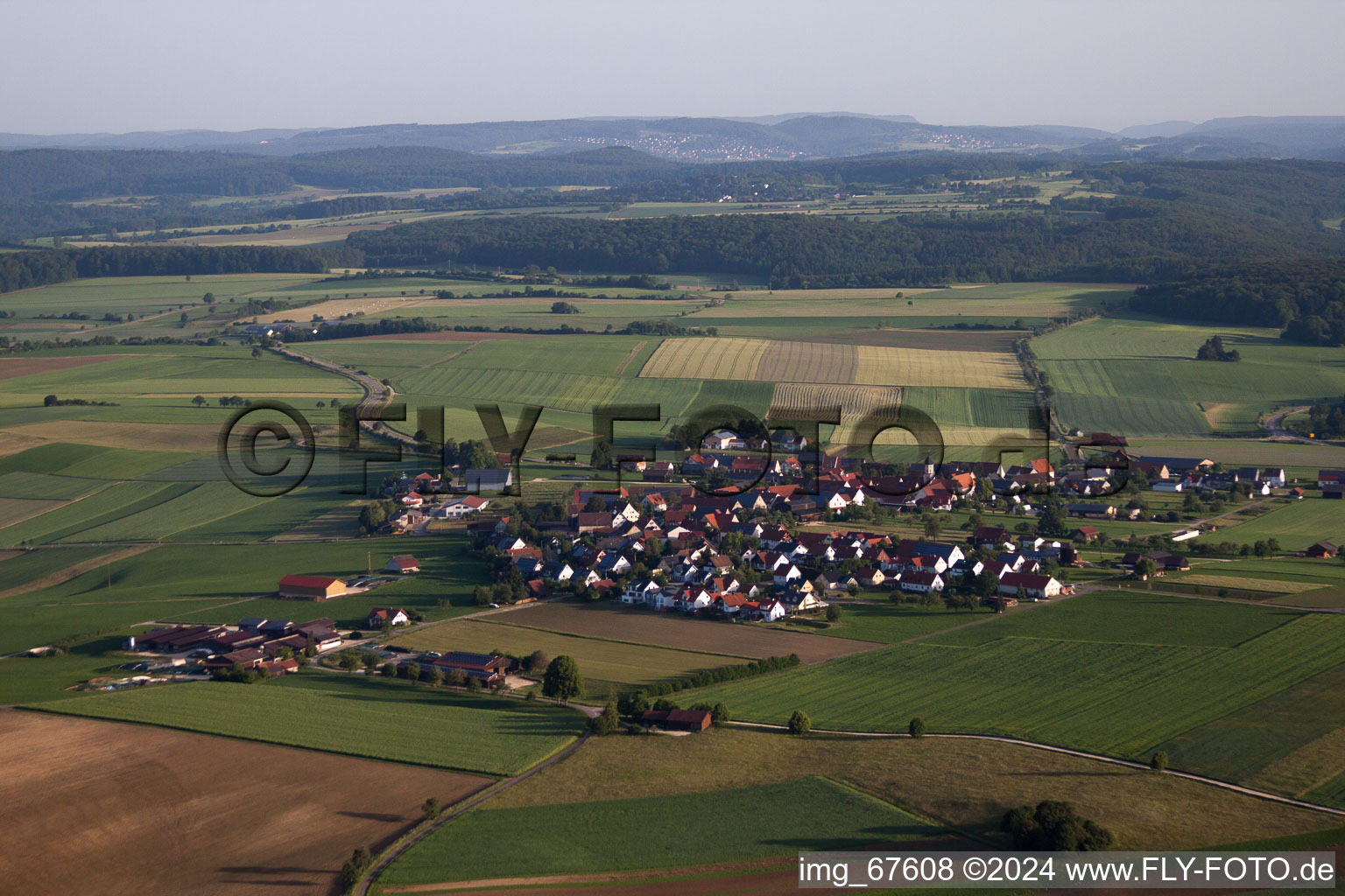 Village - view on the edge of agricultural fields and farmland in Bremelau in the state Baden-Wurttemberg