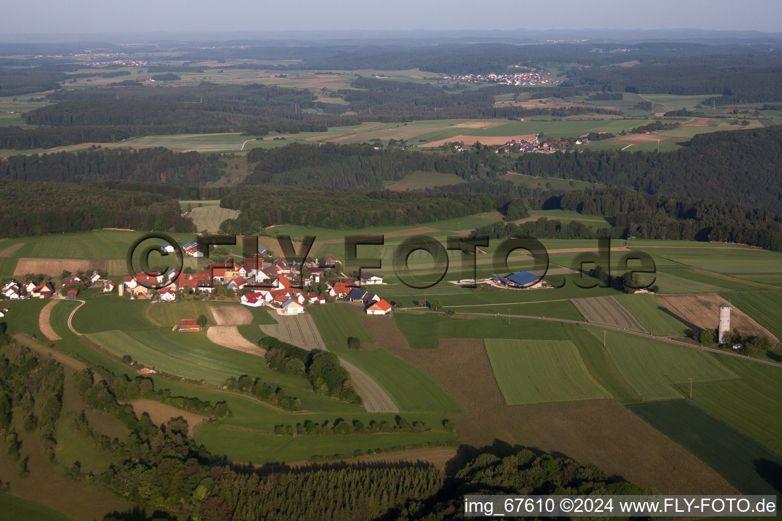 Village - view on the edge of agricultural fields and farmland in Bremelau in the state Baden-Wurttemberg