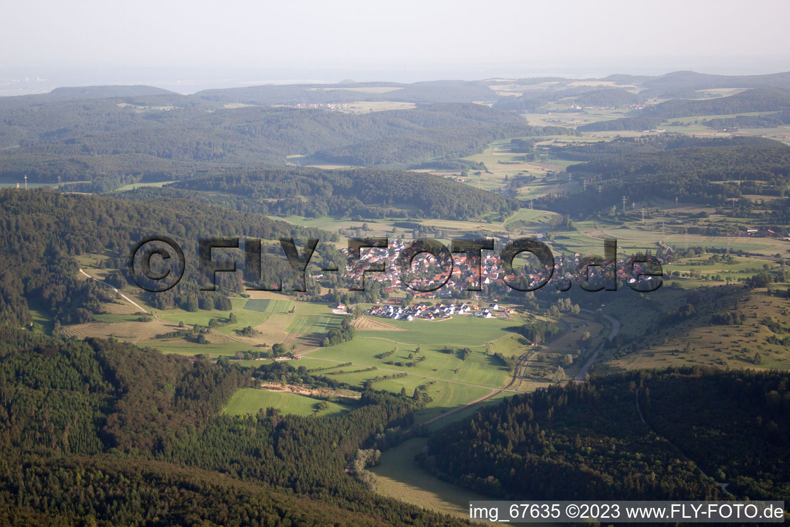 Village - view on the edge of agricultural fields and farmland in Gomadingen in the state Baden-Wurttemberg, Germany