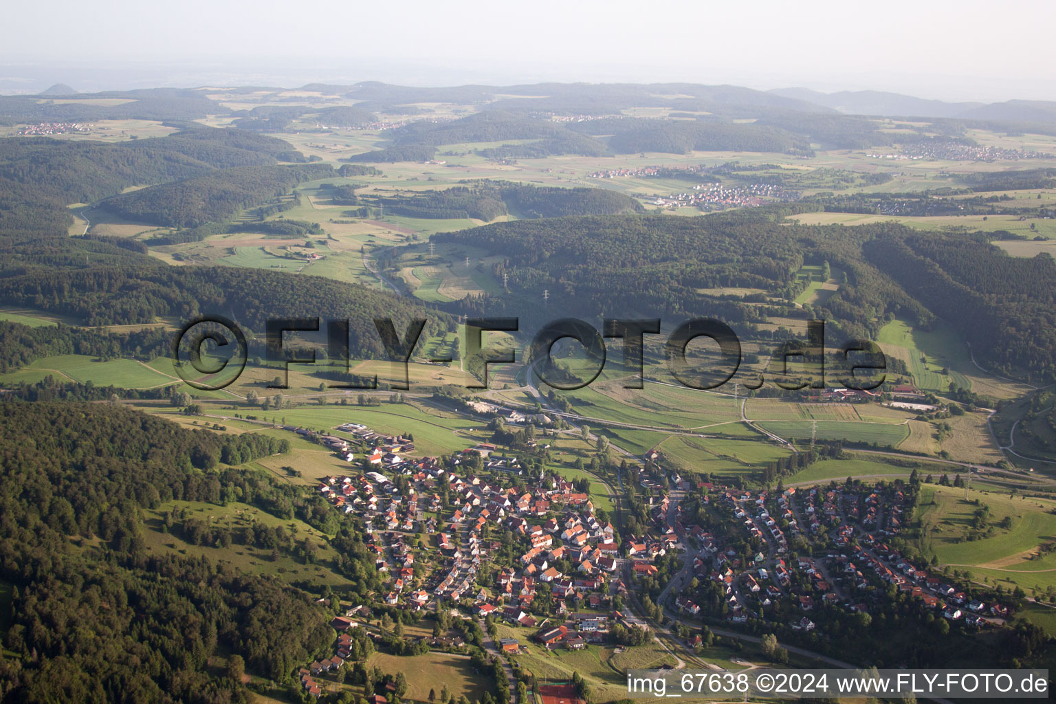 Aerial photograpy of Village - view on the edge of agricultural fields and farmland in Gomadingen in the state Baden-Wurttemberg, Germany