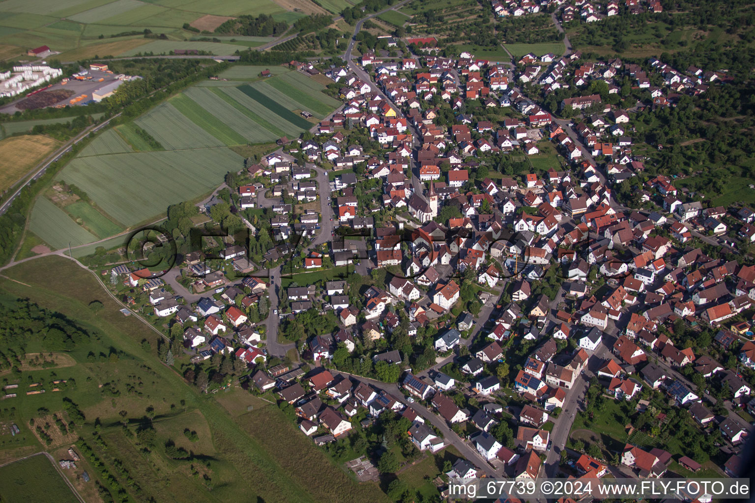 Village - view on the edge of agricultural fields and farmland in the district Kayh in Herrenberg in the state Baden-Wurttemberg, Germany