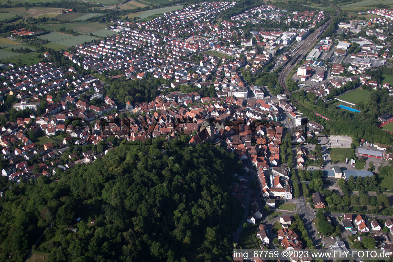 Aerial view of Schloßberg and collegiate church from the east in Herrenberg in the state Baden-Wuerttemberg, Germany