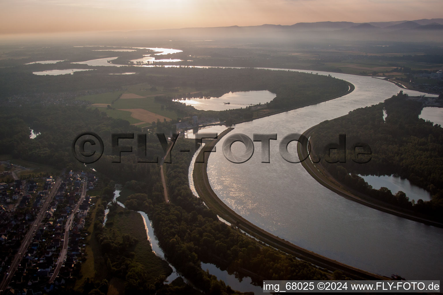 Curved loop of the riparian zones on the course of the river Rhein at the german french border in Drusenheim in Alsace-Champagne-Ardenne-Lorraine, France