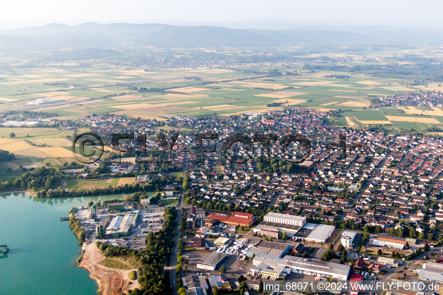 Aerial view of Village on the lake bank areas of a lake in Schutterwald in the state Baden-Wurttemberg, Germany