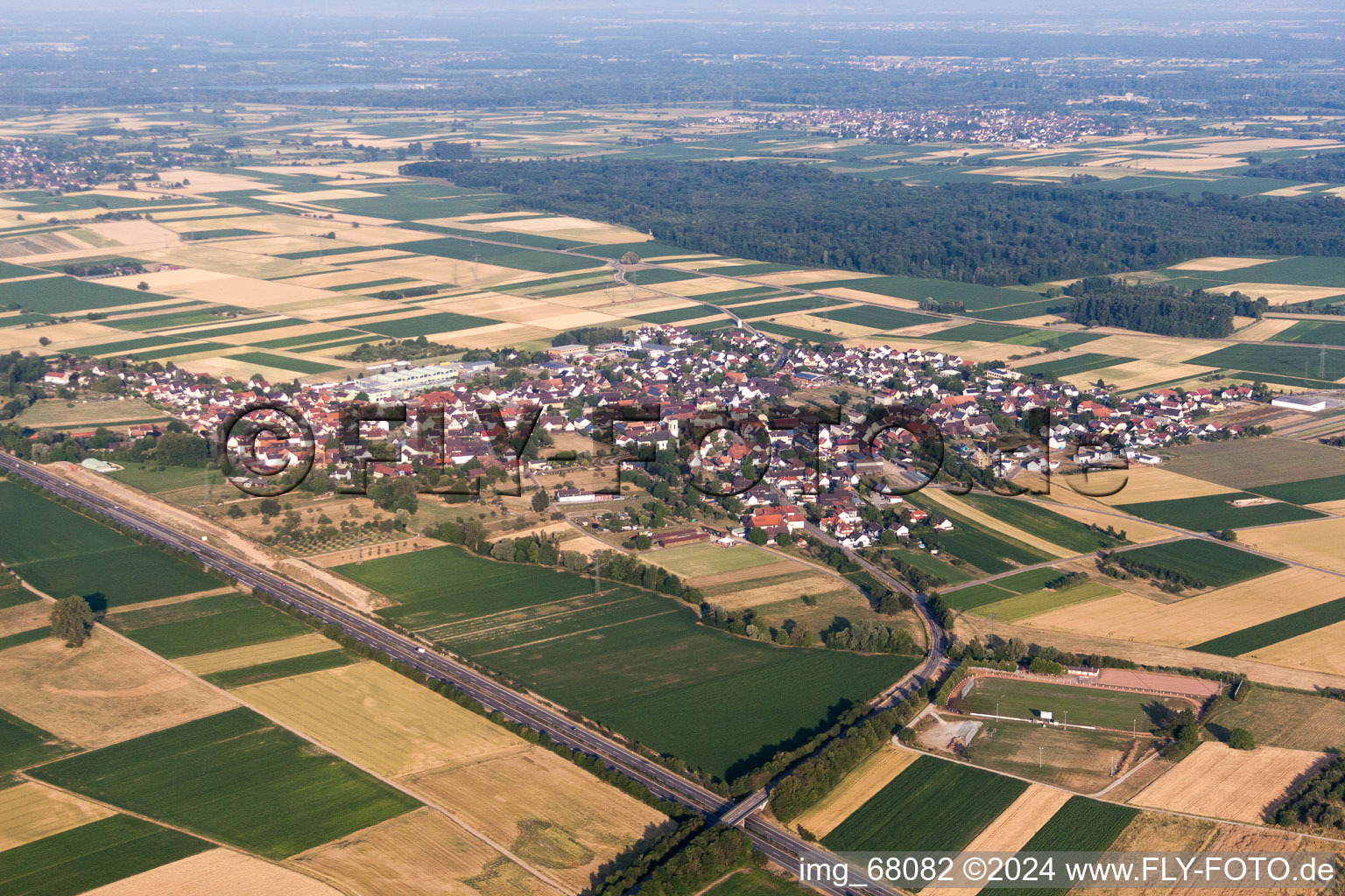 Aerial view of Village - view on the edge of agricultural fields and farmland in Kuerzell in the state Baden-Wurttemberg, Germany