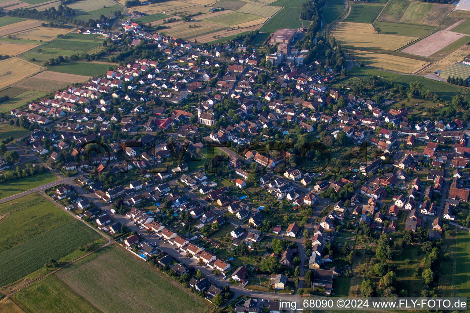 Village - view on the edge of agricultural fields and farmland in the district Hugsweier in Lahr/Schwarzwald in the state Baden-Wurttemberg, Germany