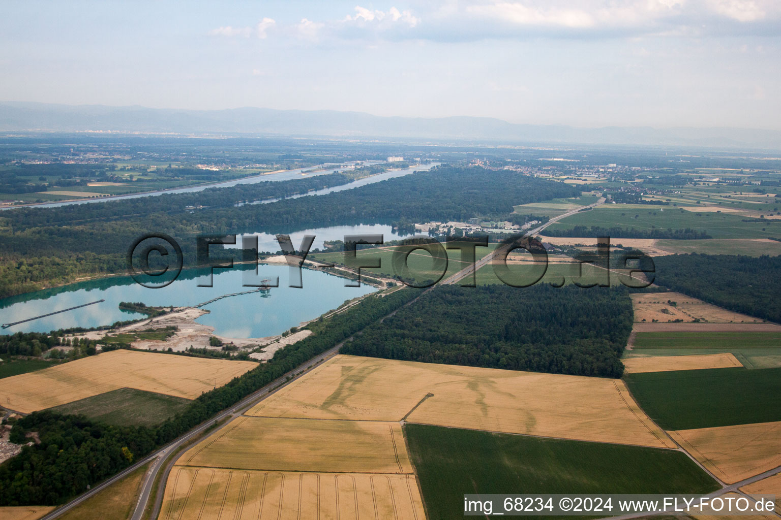 Mixed concrete and building materials factory of Birkenmeier Stein+Design in Gravel mine in the district Niederrimsingen in Breisach am Rhein in the state Baden-Wurttemberg, Germany out of the air