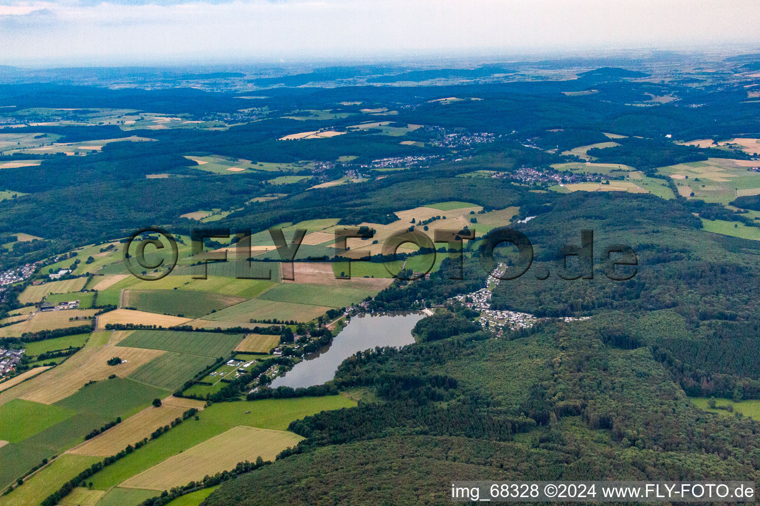 Gederner See with campsite and beach on the edge of the forest in Gedern in the state Hesse, Germany