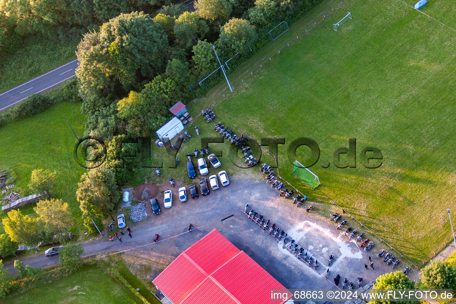 Aerial photograpy of Football field with tent camp in the district Burkhards in Schotten in the state Hesse, Germany