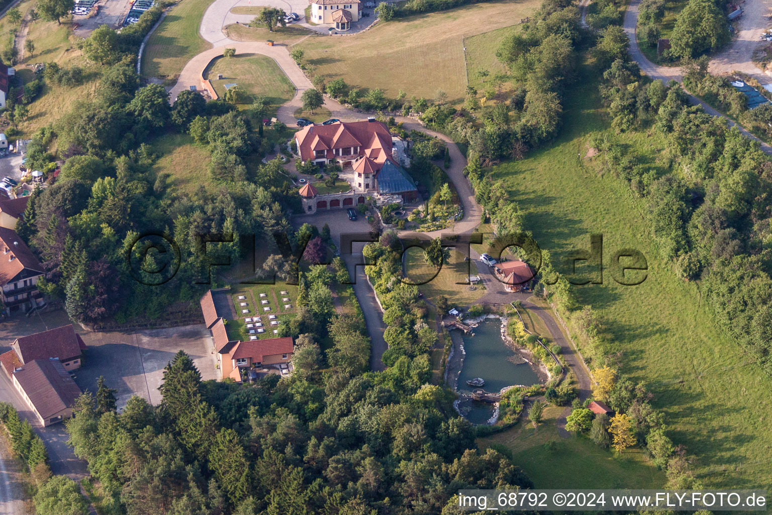 Luxury villa in residential area of single-family settlement in Oberleichtersbach in the state Bavaria, Germany