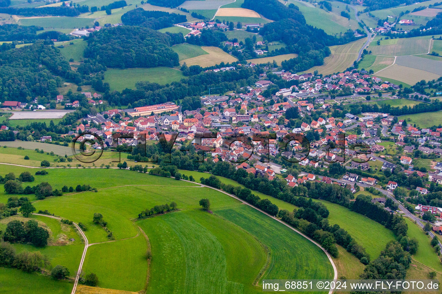 Town View of the streets and houses of the residential areas in Poppenhausen (Wasserkuppe) in the state Hesse, Germany