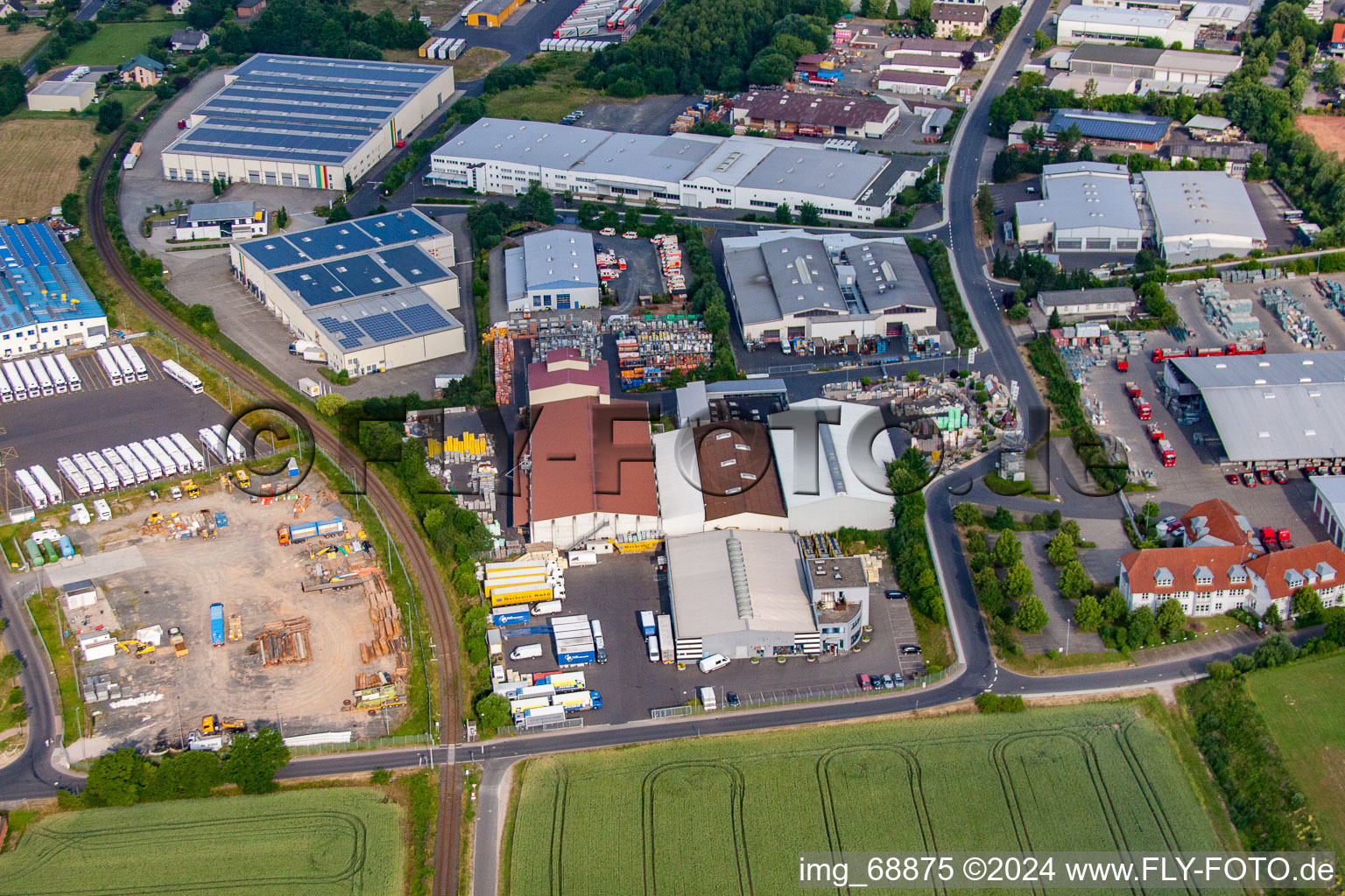 Industrial area with Raiffeisen goods-building materials in the district Welkers in Eichenzell in the state Hesse, Germany