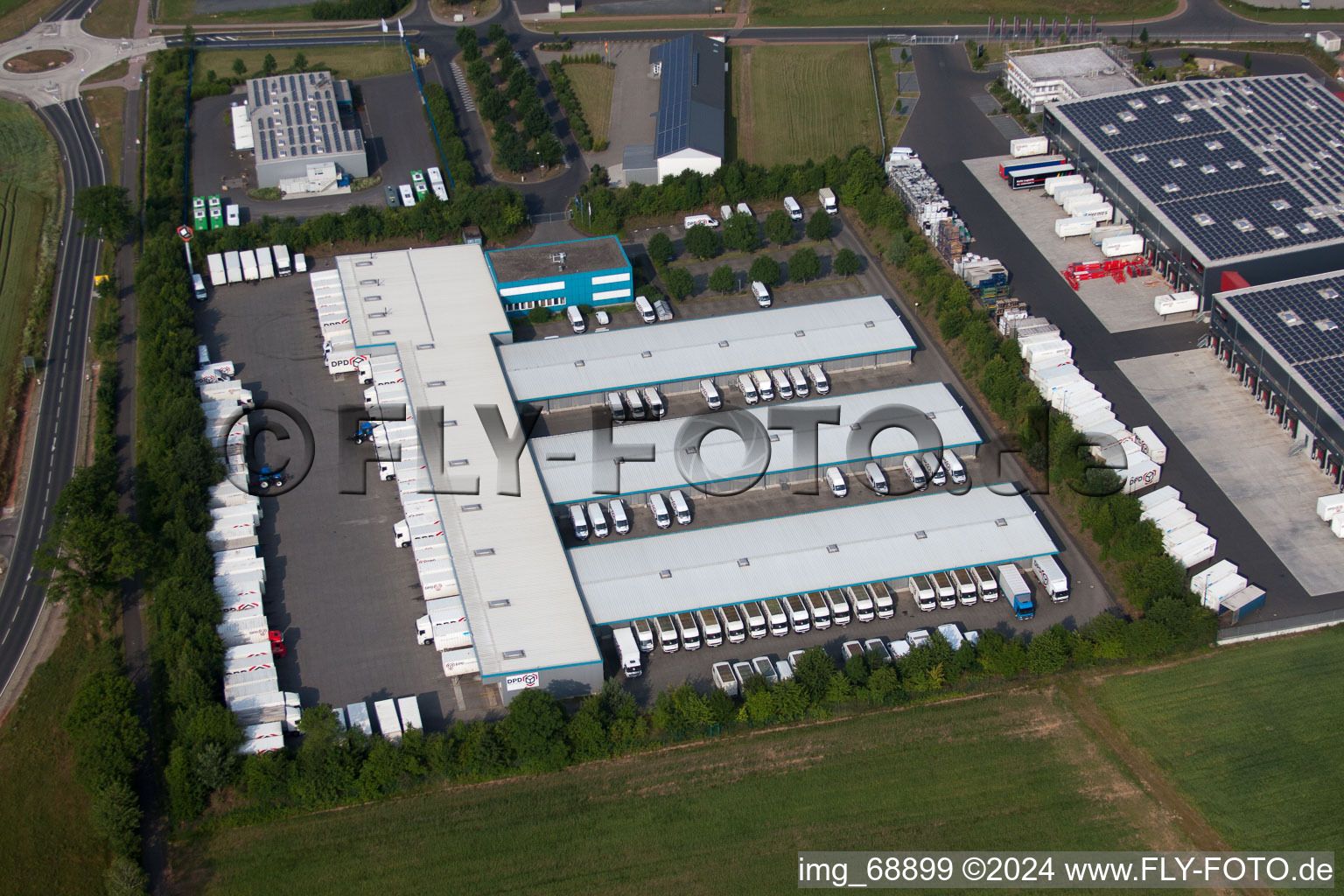 Aerial view of Industrial area with the DPD depot in the district Dorfborn in Neuhof in the state Hesse, Germany