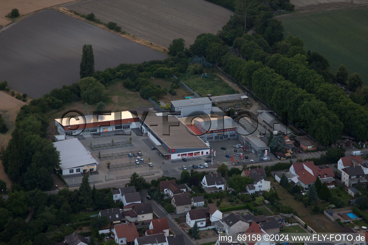 Building of the shopping center Wormser Landstr. in the district Petersau in Bobenheim-Roxheim in the state Rhineland-Palatinate