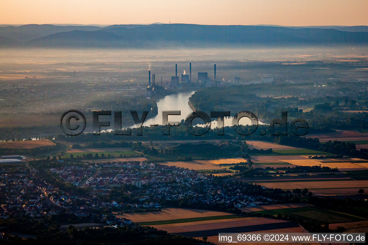 Morning mist view of Power plants and exhaust towers of thermal power station Grosskraftwerk Mannheim in Mannheim in the state Baden-Wurttemberg