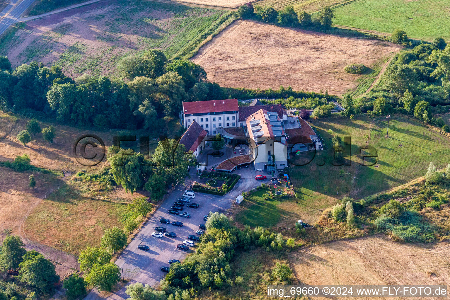 Complex of the hotel building Zeiskamer Muehle in Zeiskam in the state Rhineland-Palatinate, Germany out of the air