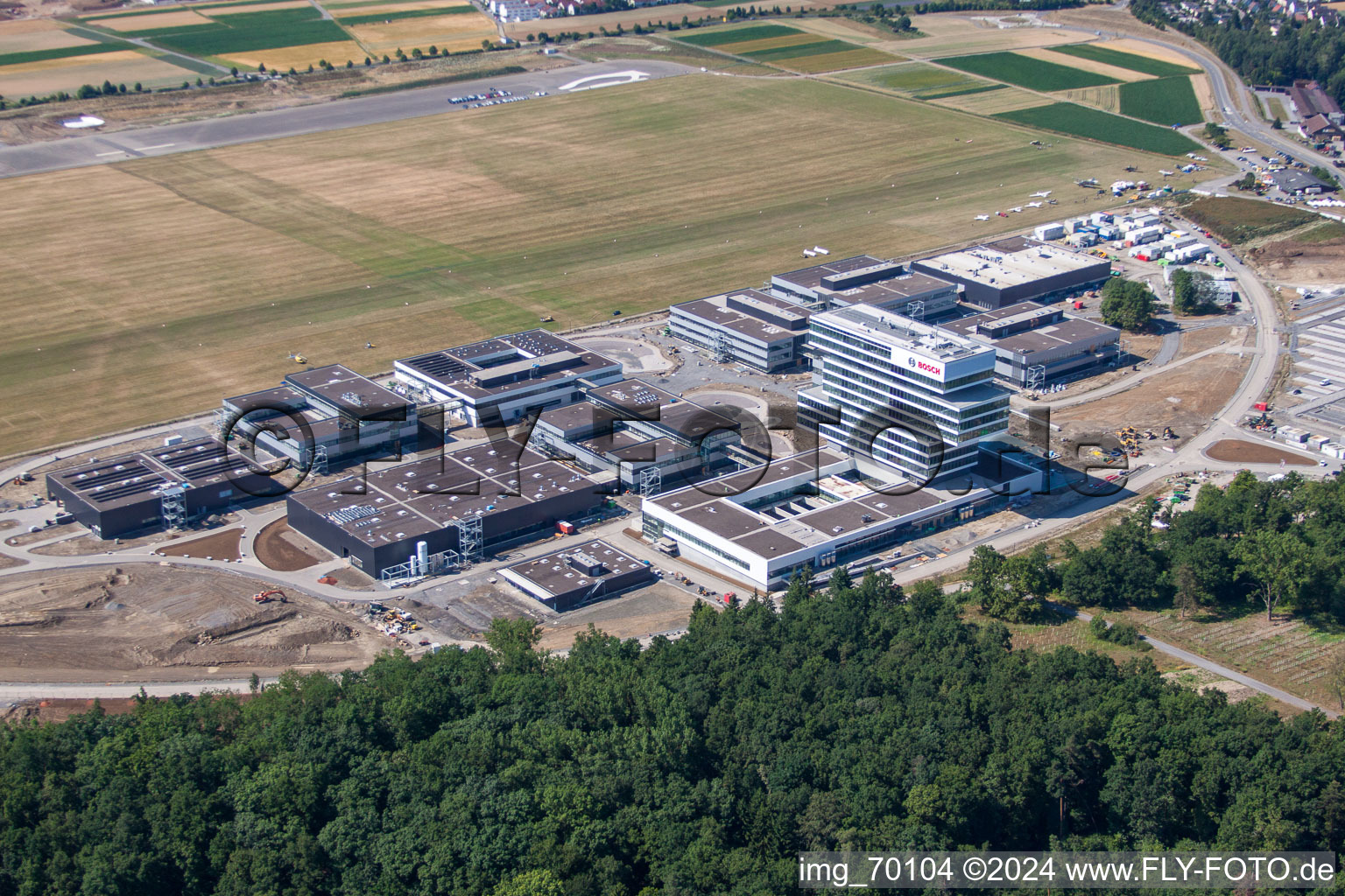 Aerial photograpy of Research building and office complex of Robert Bosch GmbH Zentrum fuer Forschung and Vorausentwicklung at glider airfield in Renningen in the state Baden-Wurttemberg, Germany