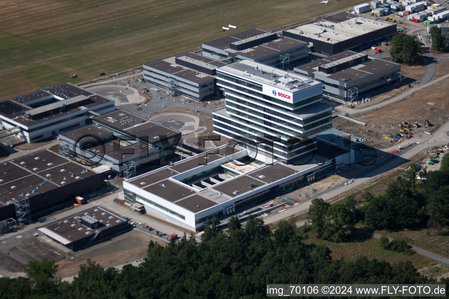 Oblique view of Research building and office complex of Robert Bosch GmbH Zentrum fuer Forschung and Vorausentwicklung at glider airfield in Renningen in the state Baden-Wurttemberg, Germany