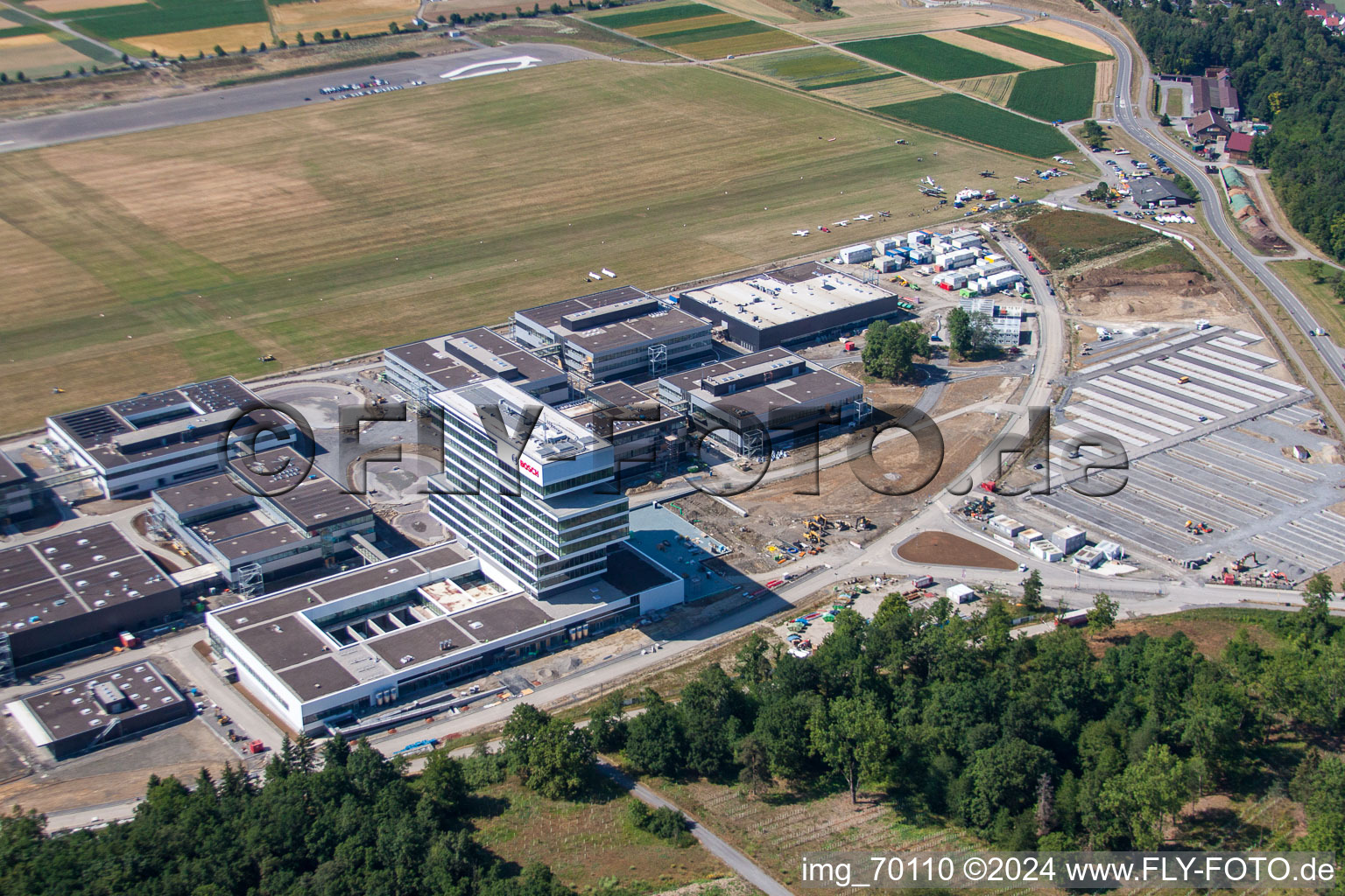 Research building and office complex of Robert Bosch GmbH Zentrum fuer Forschung and Vorausentwicklung at glider airfield in Renningen in the state Baden-Wurttemberg, Germany from above