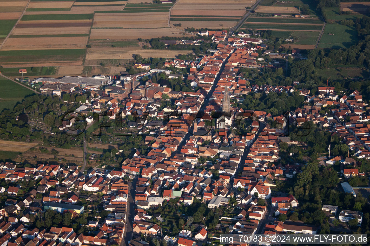 Town View of the streets and houses of the residential areas in Bellheim in the state Rhineland-Palatinate from above