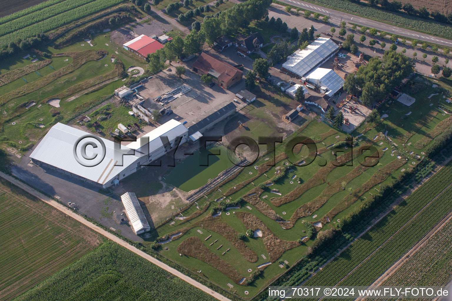 Oblique view of Tent of open-air restaurant Adamshof and foot golf   area Kandel in Kandel in the state Rhineland-Palatinate, Germany