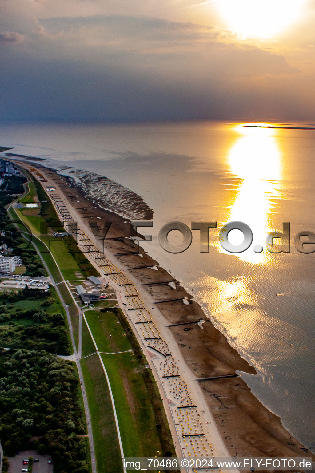 Sunset over the North Sea beach landscape in the district Döse in Cuxhaven in the state Lower Saxony, Germany