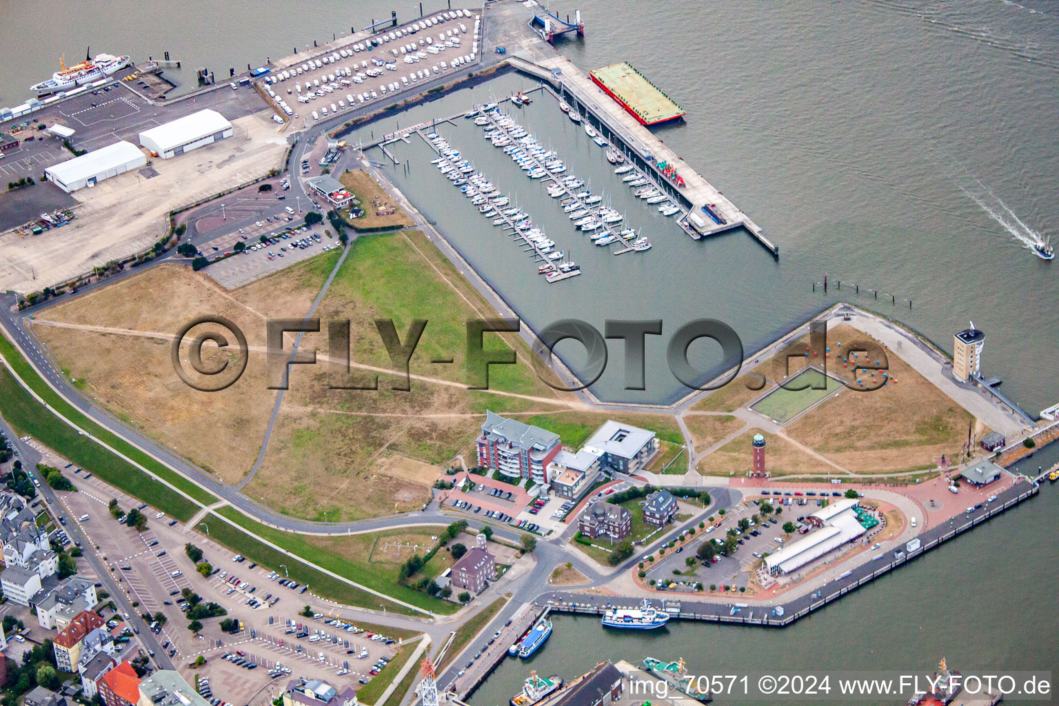 Aerial view of Port facilities on the banks of the Landwehrkanal harbor basin and Alte Liebe lighthouse in Cuxhaven in the state Lower Saxony, Germany