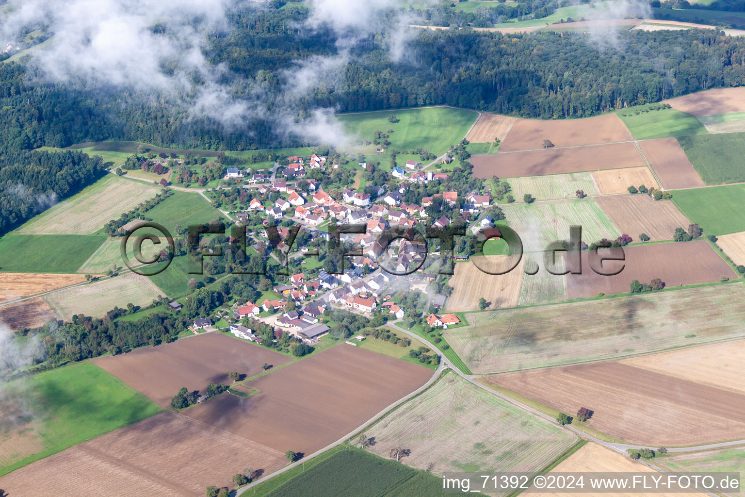 Village - view on the edge of agricultural fields and farmland in Weil in the state Baden-Wurttemberg, Germany