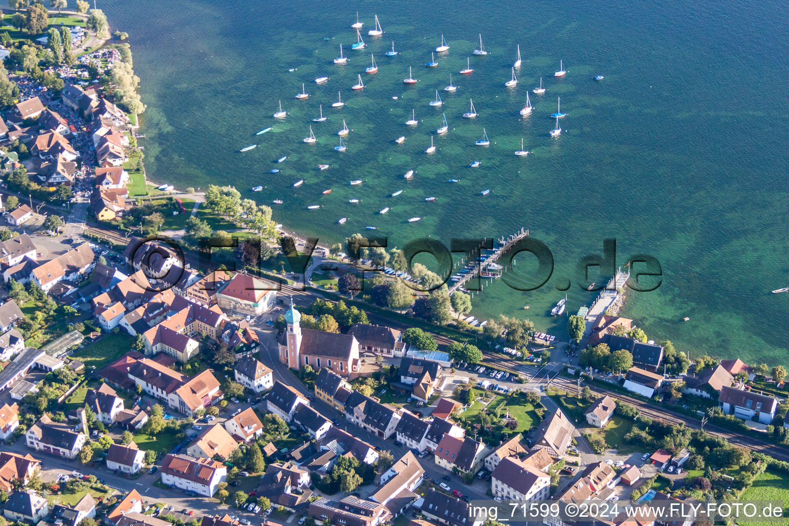 Pleasure boat marina with docks and moorings on the shore area of the lake of Constance Bodensee in Allensbach in the state Baden-Wurttemberg