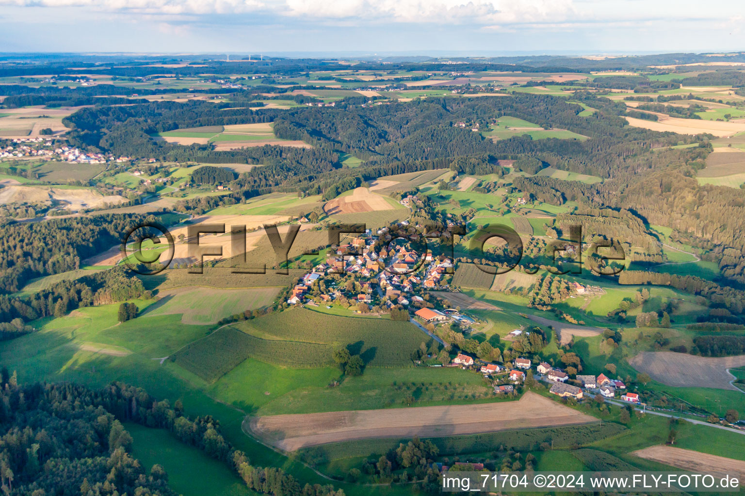 Village - view on the edge of agricultural fields and farmland in the district Taisersdorf in Owingen in the state Baden-Wurttemberg, Germany