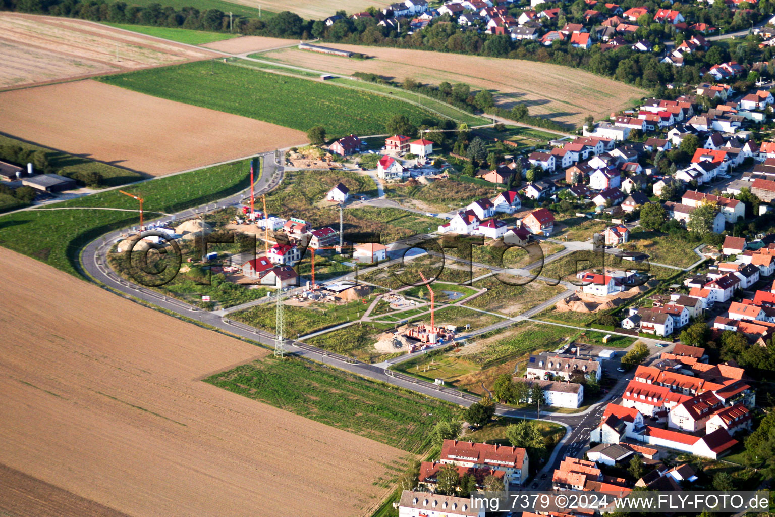 Construction sites for new construction residential area of detached housing estate Am Hoehenweg in Kandel in the state Rhineland-Palatinate out of the air