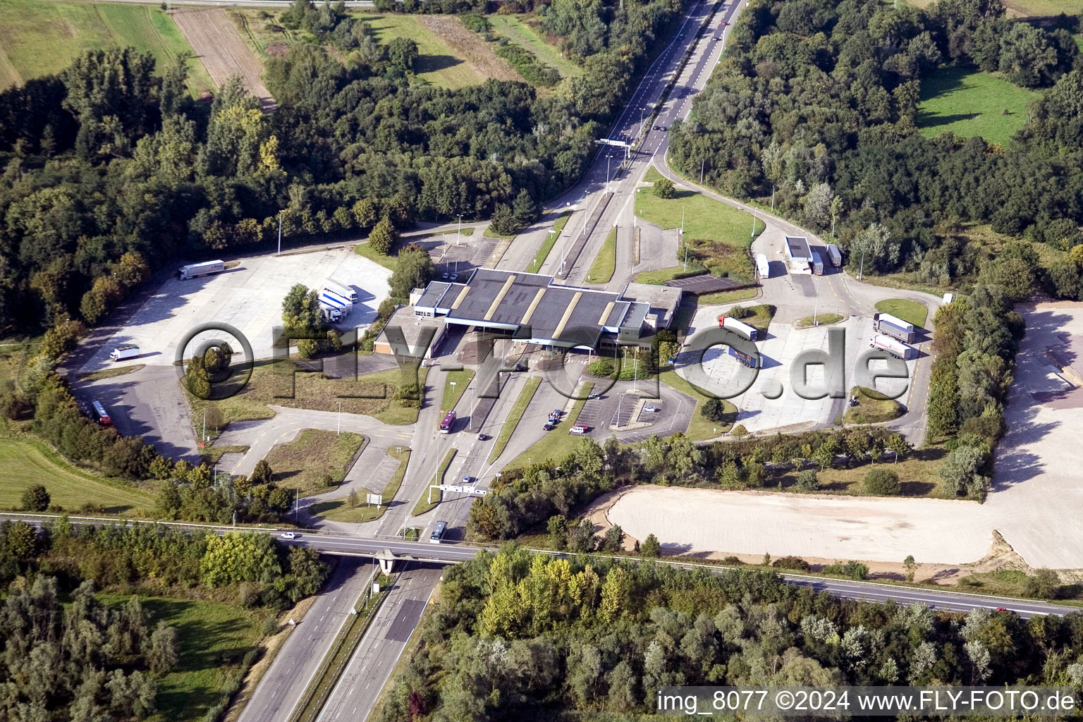 Aerial photograpy of Lorries and Truck storage areas and free-standing storage on former customs Lauterbourg now state-police department Bienwald in Scheibenhard in Grand Est, France