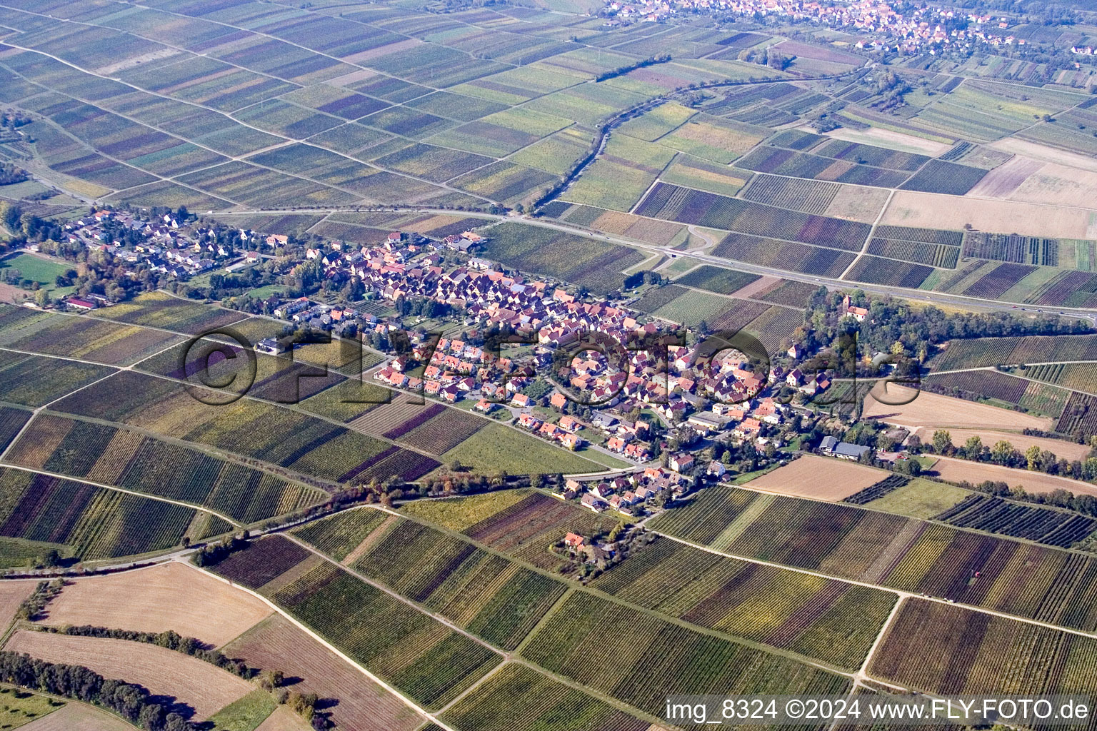 Village - view on the edge of agricultural fields and farmland in the district Wollmesheim in Landau in der Pfalz in the state Rhineland-Palatinate, Germany