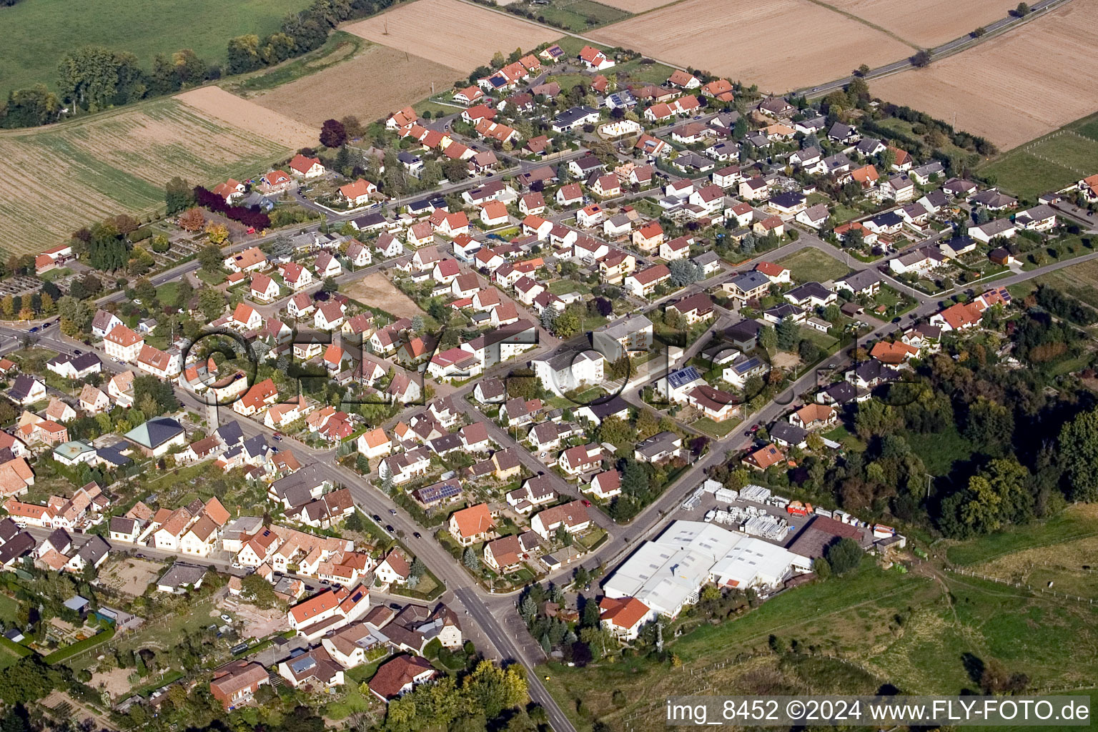 Town View of the streets and houses of the residential areas in Billigheim-Ingenheim in the state Rhineland-Palatinate from above