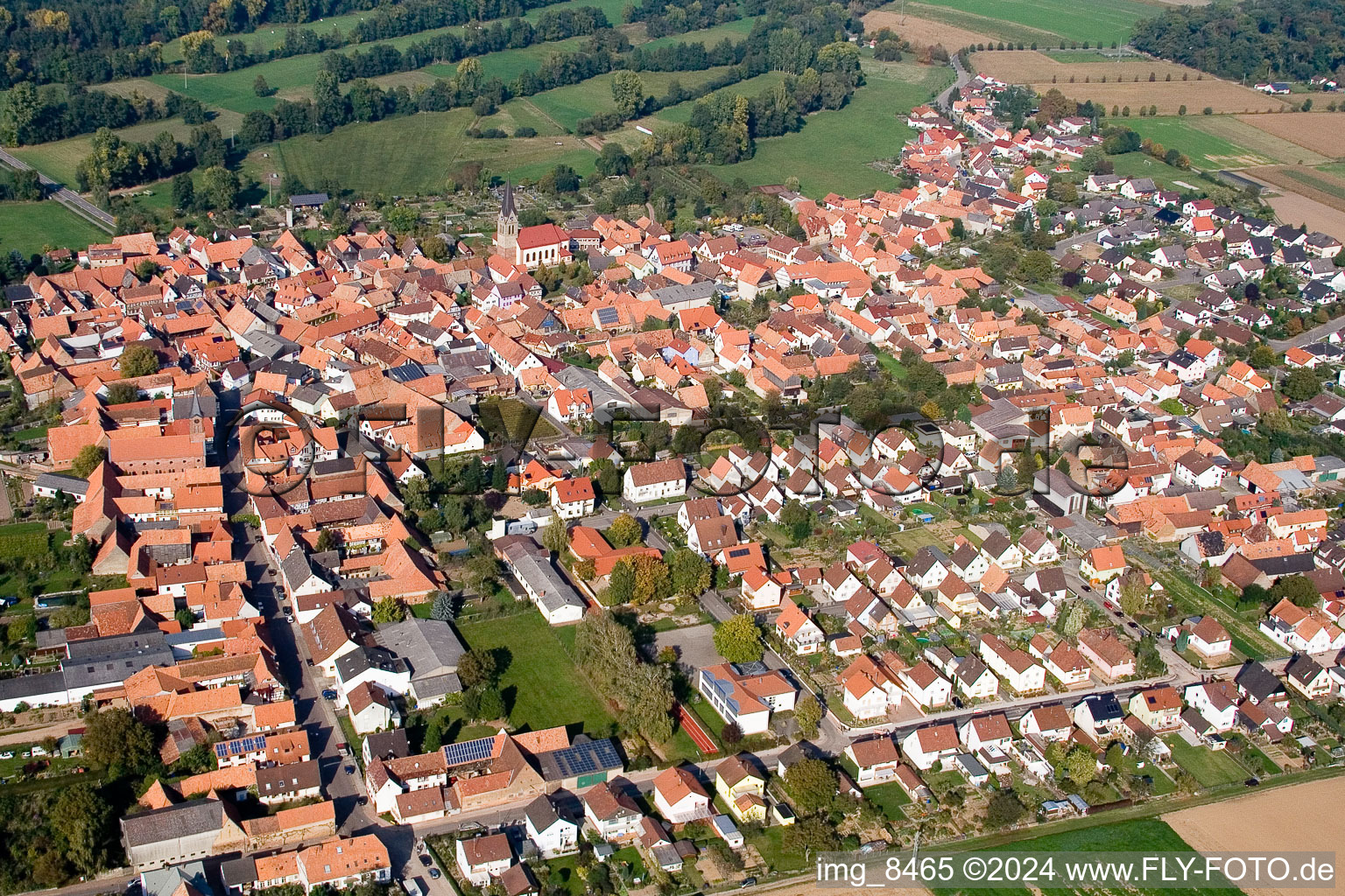 Aerial photograpy of Village - view on the edge of agricultural fields and farmland in Steinweiler in the state Rhineland-Palatinate