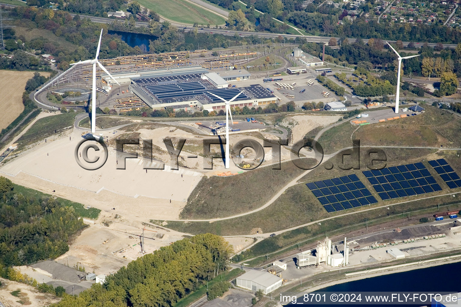 Wind turbines on a mountain of rubbish in the district Rheinhafen in Karlsruhe in the state Baden-Wuerttemberg, Germany