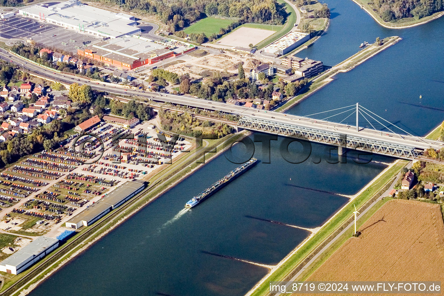 Bird's eye view of Rail and Street bridges construction across the Rhine river between Karlsruhe and Woerth am Rhein in the state Rhineland-Palatinate, Germany