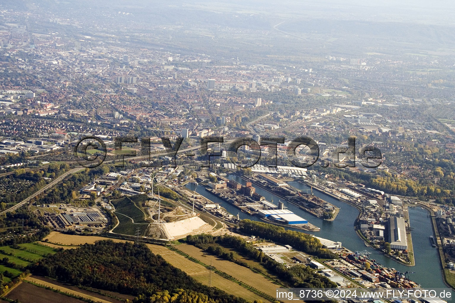 Wind turbines on garbage mountain at Rheinhafen in the district Rheinhafen in Karlsruhe in the state Baden-Wuerttemberg, Germany