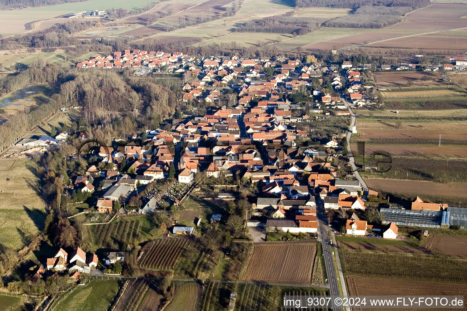 Village - view on the edge of agricultural fields and farmland in the district Gewerbegebiet Horst in Winden in the state Rhineland-Palatinate